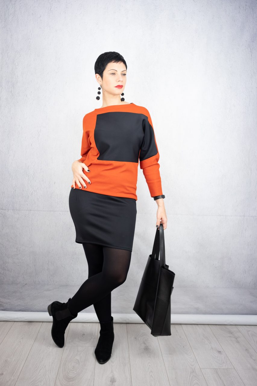 Colour block fitted dress in orange and black, leather tote and suede ankle boots